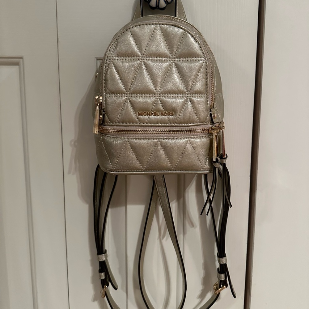 Mini Michael kors purse in gold
